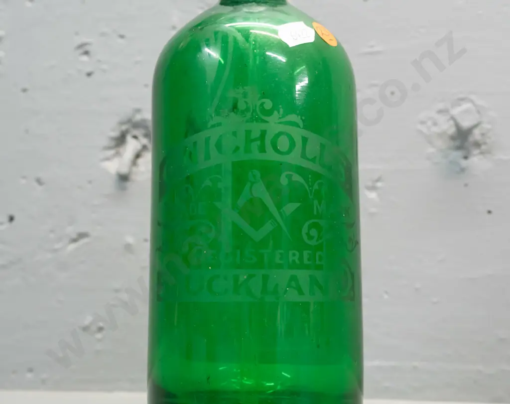 green glass soda syphon - both bottle and cap marked C. Nicholls Auckland H-300 - interior fault at bottom Image 1++