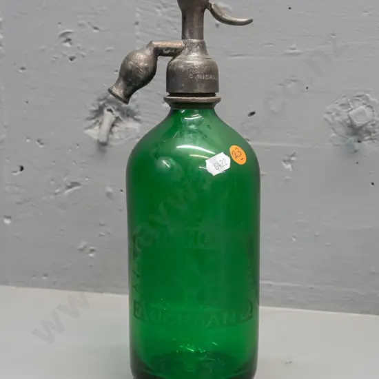 green glass soda syphon - both bottle and cap marked C. Nicholls Auckland H-300 - interior fault at bottom
