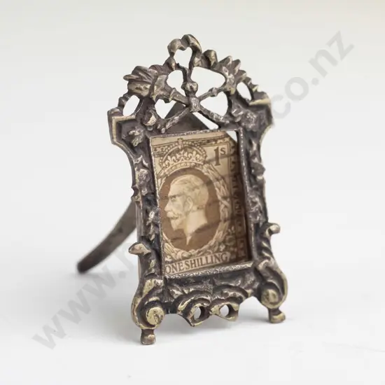George V one shilling stamp in miniature picture / photo frame with unknown mark