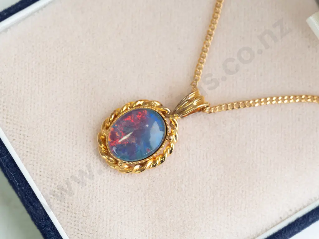 silver opal pendant stamped 925 with gold plated chain Image 1++