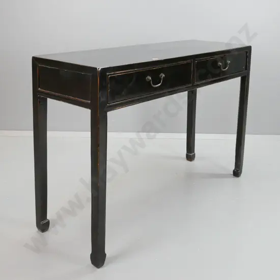 Chinese black lacquer 2-drawer altar table with panelled sides, square legs on bracket feet, brass swan neck handles to