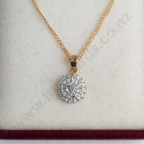 9ct cluster diamond pendant with gold plate chain  3.2gms