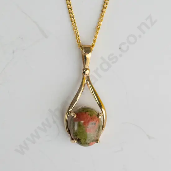 9ct brown/green stone pendant - stamped on pendant