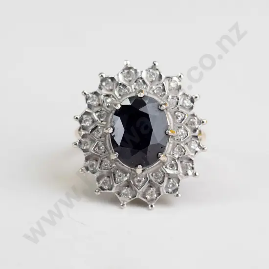 9ct sapphire [10x8] & 2 frier diamond ring 6.1 gms