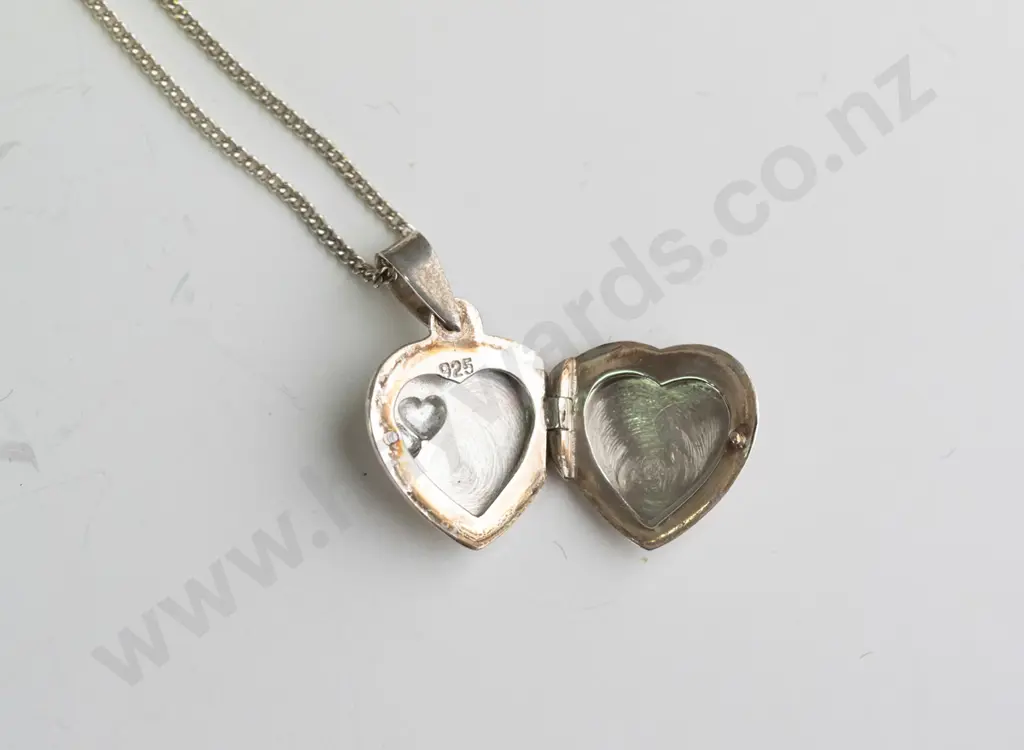 silver heart locket with 2 raised heart on front stamped 925 Image 1++