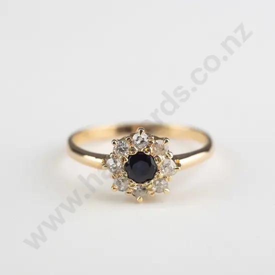18ct sapphire & diamond cluster centre 3.00mm sapphire surrounded by 8 diamond approx .03