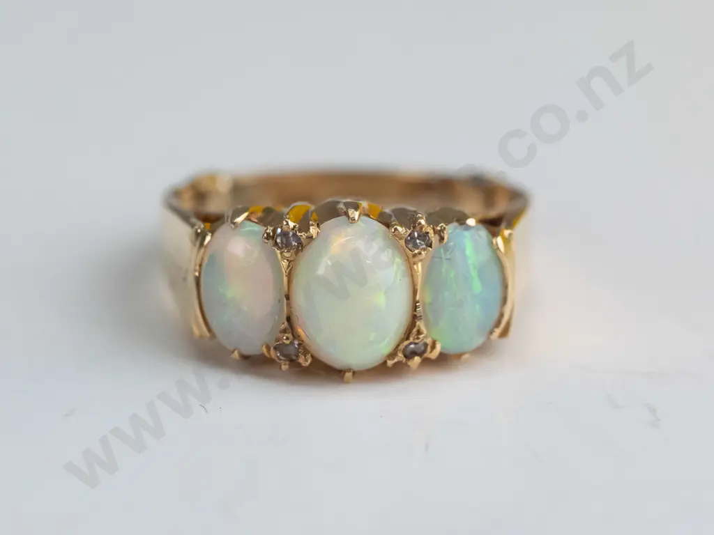 18ct gold, 3 opal, 4 diamond, London Bridge setting ring 6.5gms Image 1++