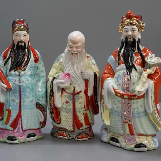 3 Chinese hand painted figures, character marks on base, one missing head-dress pieces, one missing top of staff. Taller