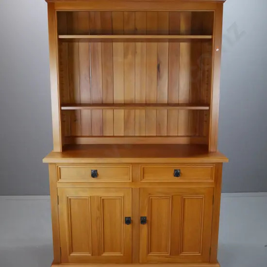 contemporary bespoke solid rimu wall unit with 2 solid panel doors, 2 dovetail drawers, cast metal drop handles