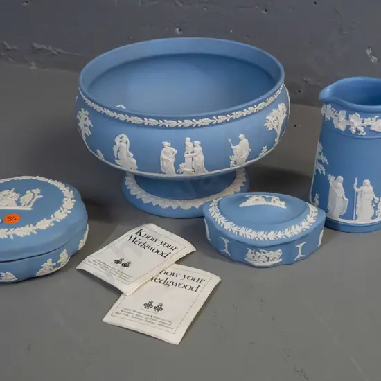 4 pieces of Wedgwood pale blue jasperware - comport H-130 D-200, jug and 2 lidded canisters
