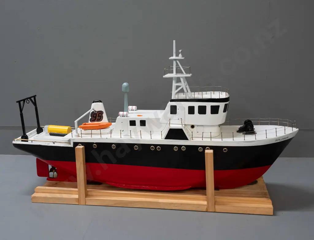 large motorised model boat - rescue vessel, marked Ixplorer. Untested. On wooden stand H-410 L-740. Image 1++