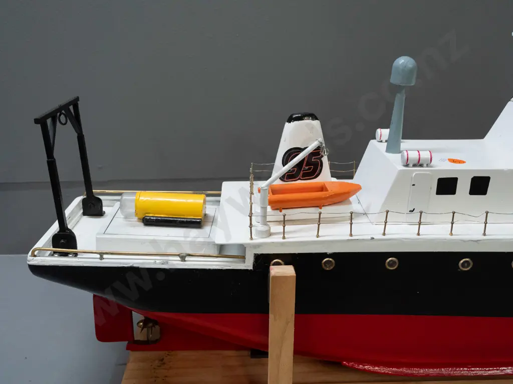 large motorised model boat - rescue vessel, marked Ixplorer. Untested. On wooden stand H-410 L-740. Image 1++