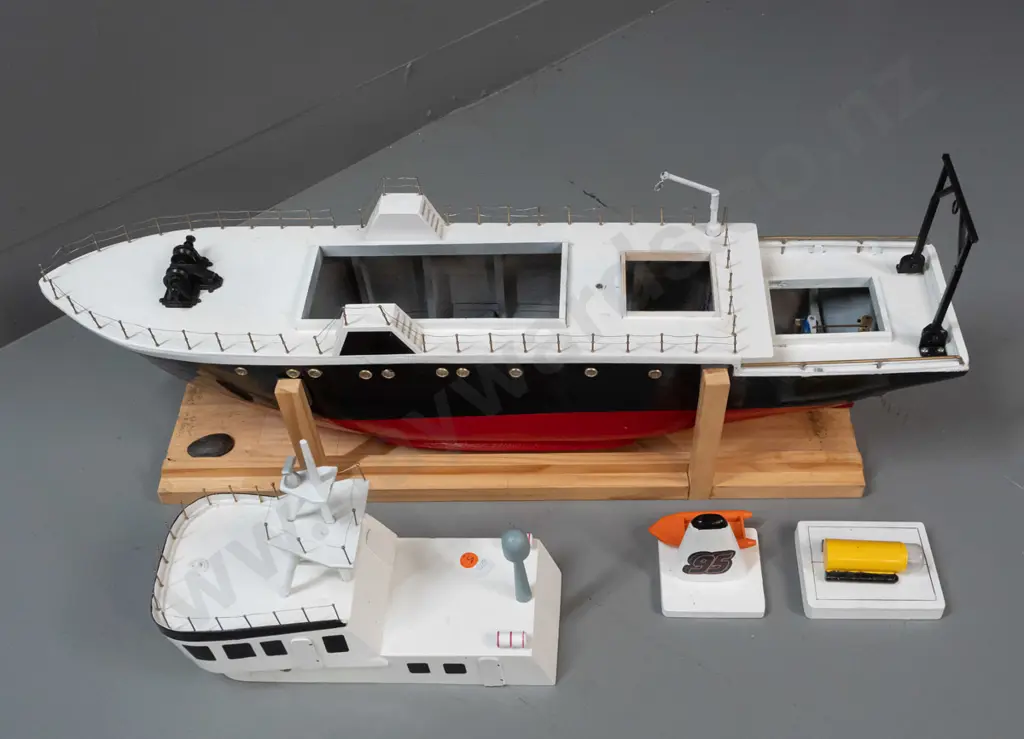 large motorised model boat - rescue vessel, marked Ixplorer. Untested. On wooden stand H-410 L-740. Image 1++