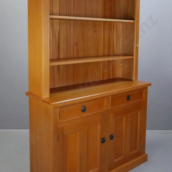 contemporary bespoke solid rimu wall unit with 2 solid panel doors, 2 dovetail drawers, cast metal drop handles