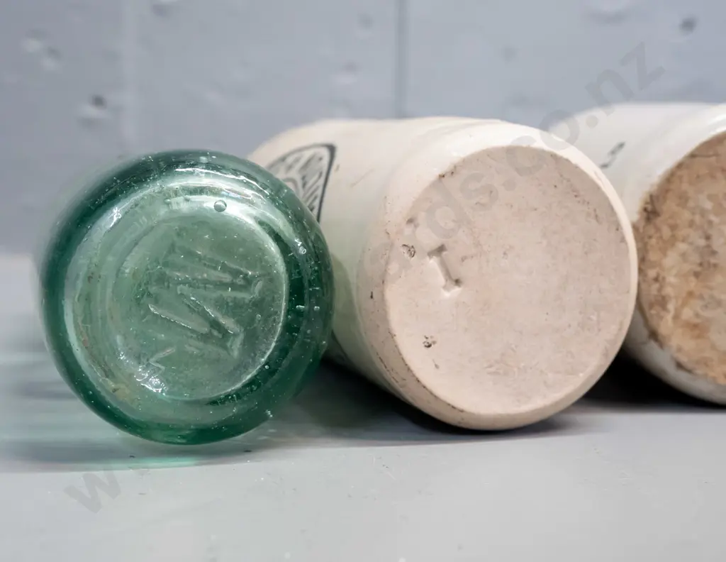 2 stoneware ginger beer bottles - C.L. Innes Auckland & Hamilton, Merbein Cordial Works / Chiselett - and a Moffatt & Co Image 1++
