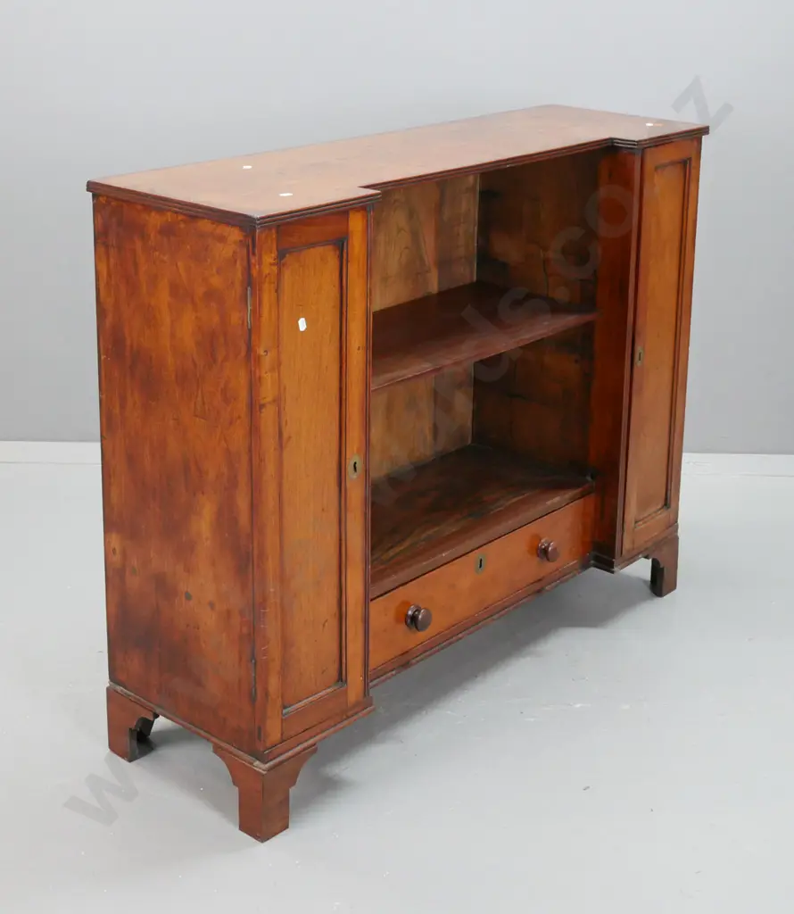 late Georgian mahogany inverted break-front bookcase w/ 2 panelled doors, inner shelves, central cavity w/ single shelf, Image 1++