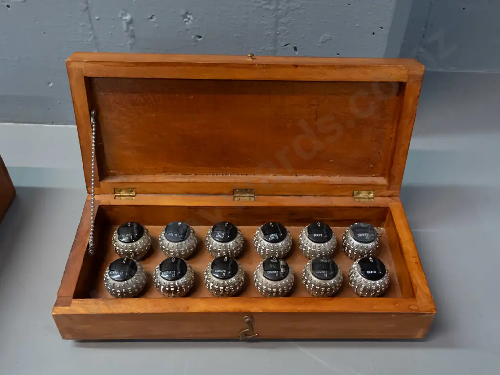 wood cased set of 8 IBM Selectric typewriter type ball heads. Case H-80 W-300 D-130 Image 1++