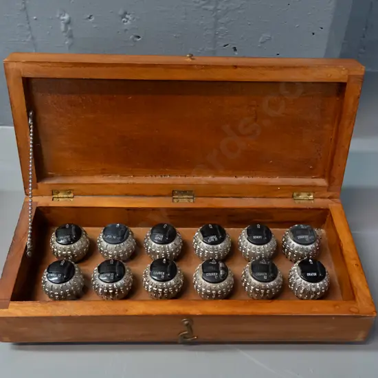 wood cased set of 8 IBM Selectric typewriter type ball heads. Case H-80 W-300 D-130