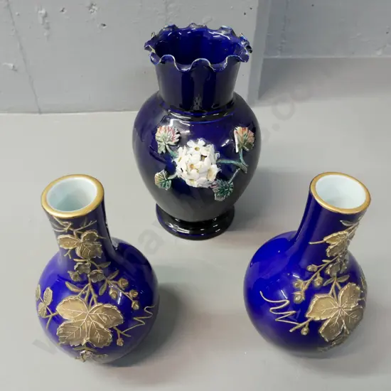 3x cobalt blue vases: 2x overlaid blue-over-white glass bottle vases with applied gold foliate decoration;