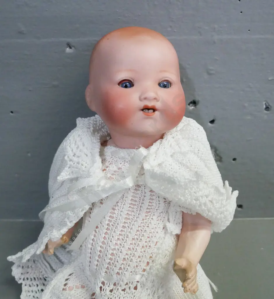 porcelain small sleeping doll by Armand Marseille Germany, blue glass opening/closing eyes, signed on back of head. Image 1++