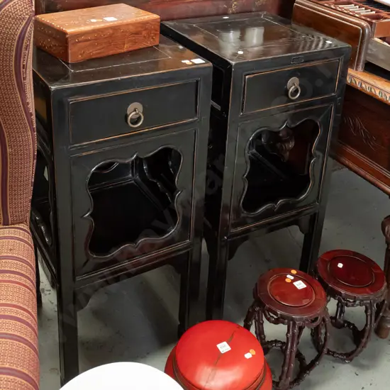 pair of 19th century Chinese elm black lacquered flower stands / tables from Shanxi with single drawer, shelf w/ shaped