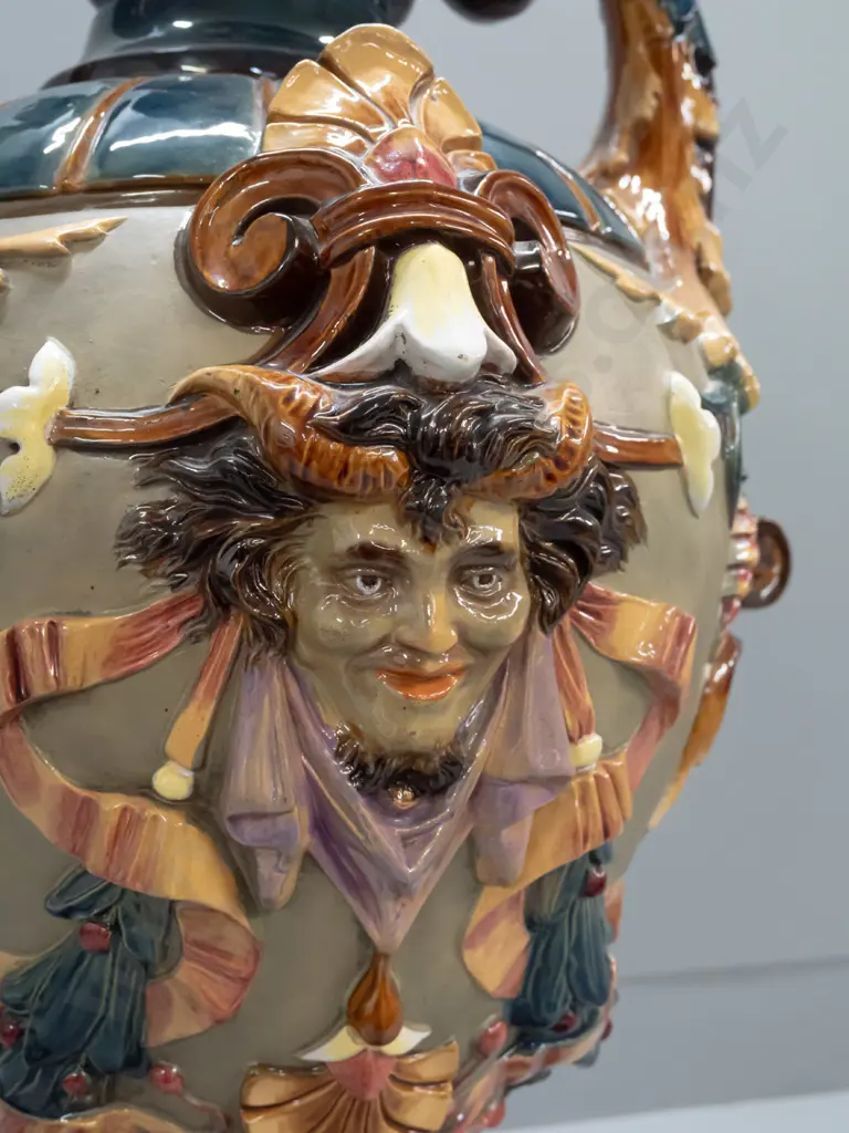 large Wilhelm Schiller & Sons Majolica lidded urn with foliate scrolling handles, acanthus leaf motifs, 2 heads, fluted Image 1++