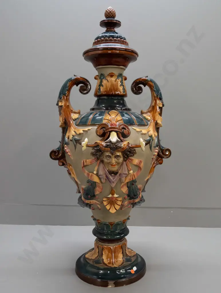 large Wilhelm Schiller & Sons Majolica lidded urn with foliate scrolling handles, acanthus leaf motifs, 2 heads, fluted Image 1++