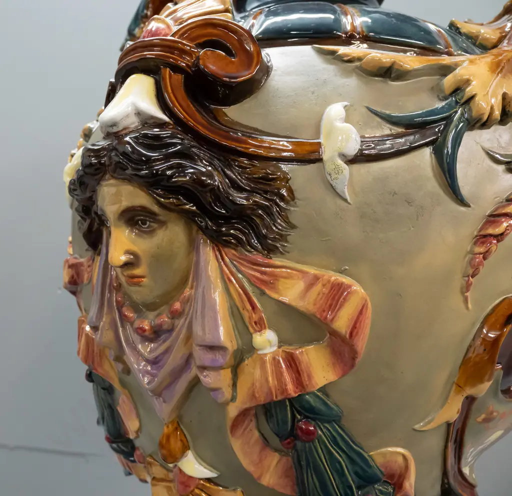 large Wilhelm Schiller & Sons Majolica lidded urn with foliate scrolling handles, acanthus leaf motifs, 2 heads, fluted Image 1++
