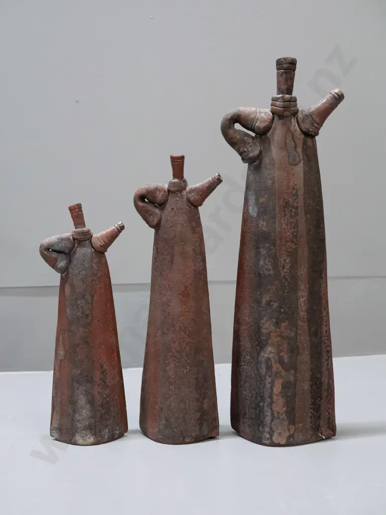 J. Russell NZ studio pottery trio of ornamental teapots - 2 w/loose stoppers, one with adhesive residue. Tallest is H330 Image 1++