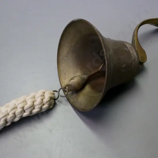 Wall-mounted brass bell, plaited rope handle