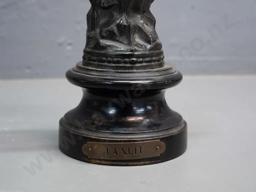art nouveau maiden figure standing on an eagle holding a star, 'La Nuit'. Rounded wooden base with a plaque. Image 1++
