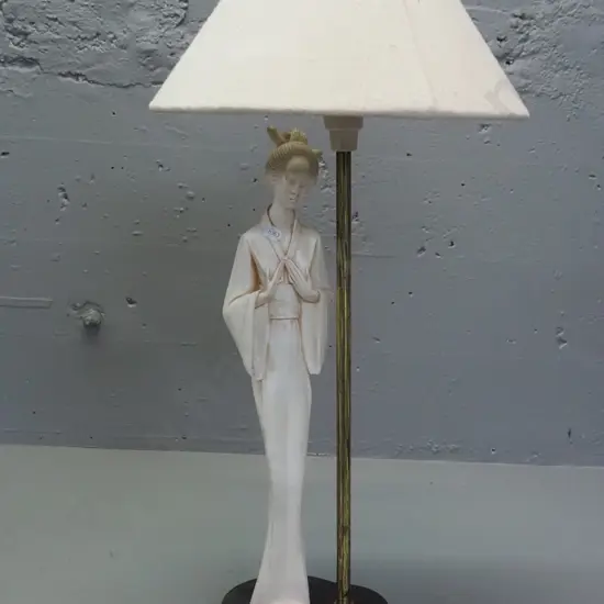 figural table lamp with composite Japanese style figure on composite base, brass finish lamp support - some staining and