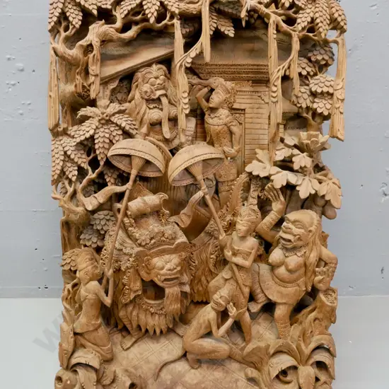 vintage Southeast Asian carved wooden scene depicting mythical beasts