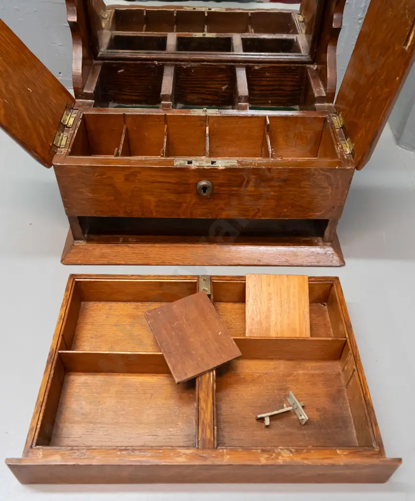vintage oak tantalus with 3 decanters, lift-up lids exposing storage compartments, concealed latch for lower spring- Image 1++