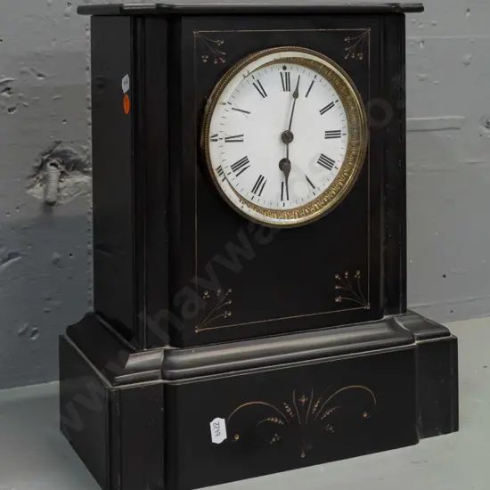 vintage mantel clock with Belgian black marble case, porcelain face, French movement. Scratch to the porcelain face,