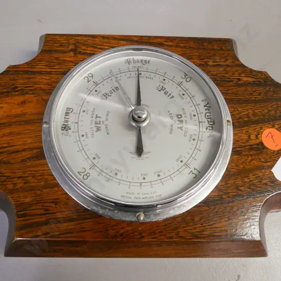 wall-hanging Art Deco barometer in oak case. Smiths, Made in England. H-150 W-220
