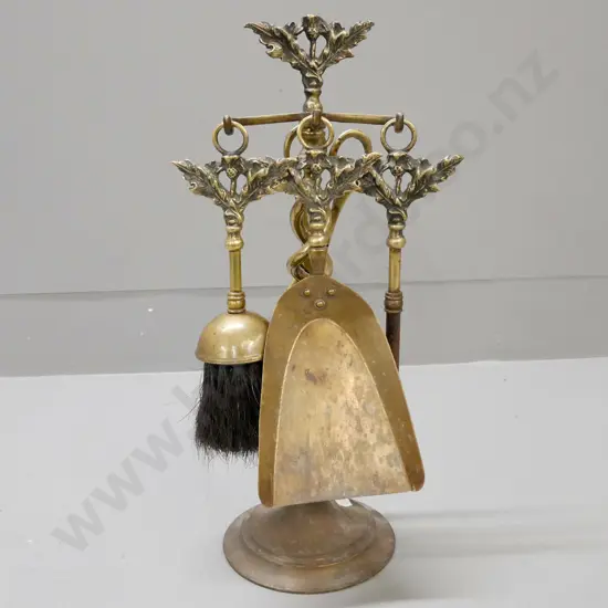 vintage brass fireside set with open twist support, holding poker shovel brush & tongs, w/ scotch thistle decoration
