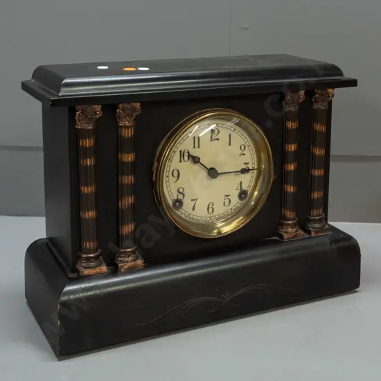 Sessions mantel clock in black finish timber case with applied metal fluted columns, enamel face - bezel hinge is broken