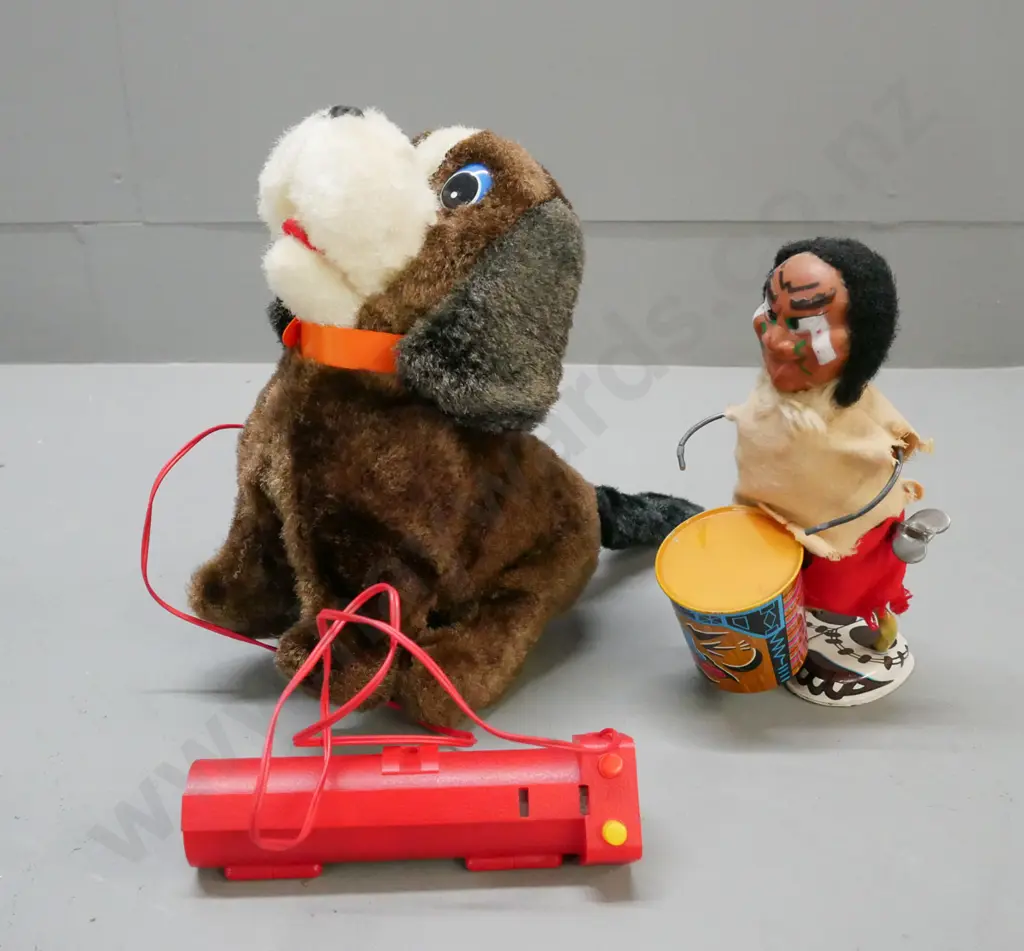 1x battery-powered Japanese vintage acrobat pup; 1x wind-up vintage first nations drummer Image 1++