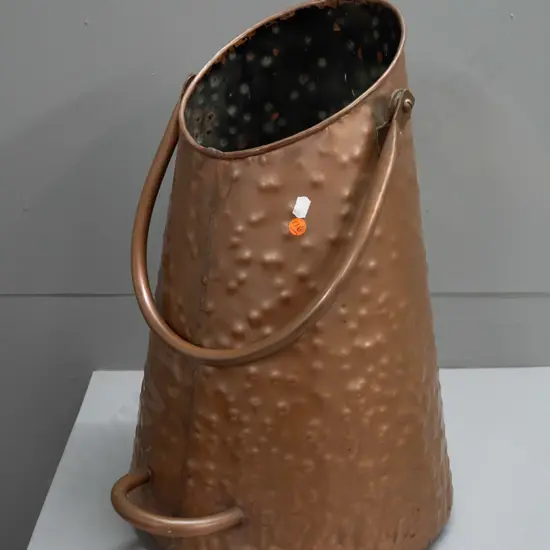 large beaten copper double handled coal scuttle H-500 D-330 at base