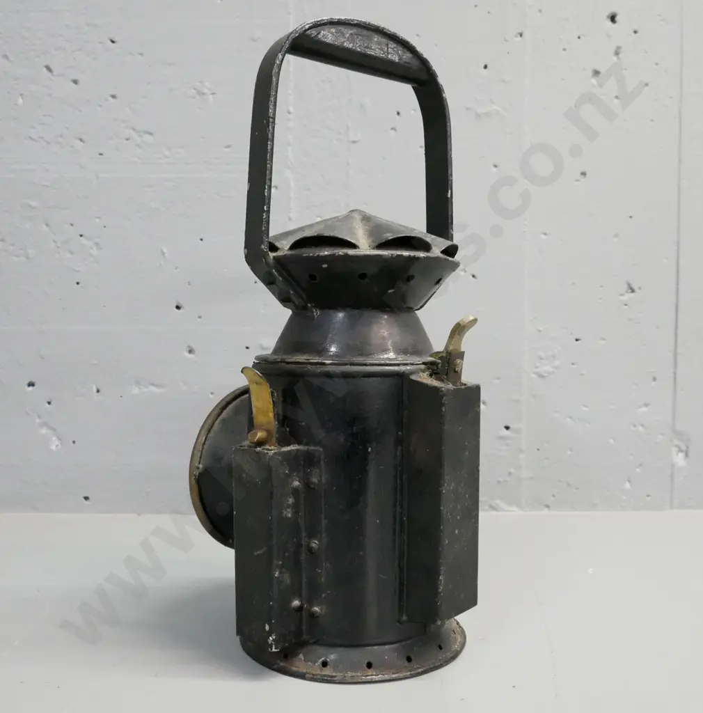 vintage brass & metal Lantern. Clear glass bezel outside. Door opens to reveal red glass reflector inside. H-340 D-160 Image 1++