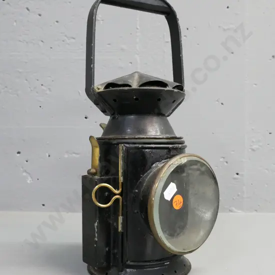 vintage brass & metal Lantern. Clear glass bezel outside. Door opens to reveal red glass reflector inside. H-340 D-160