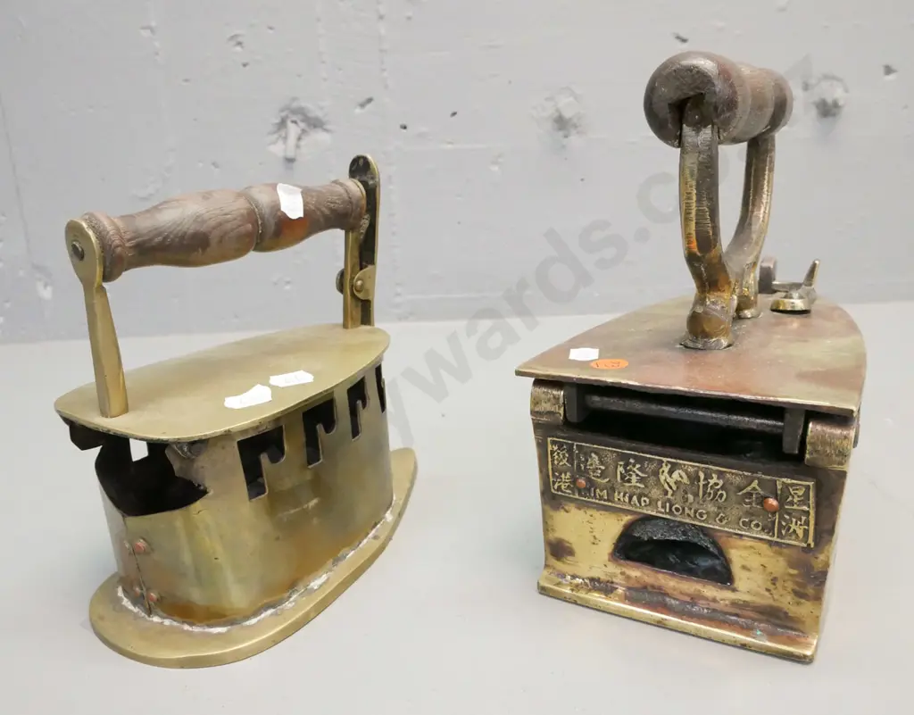 2x Chinese brass coal irons with turned wooden handles. 1. Kim Hiap Liong & Co H-220 W-210. 2. Unmarked Image 1++