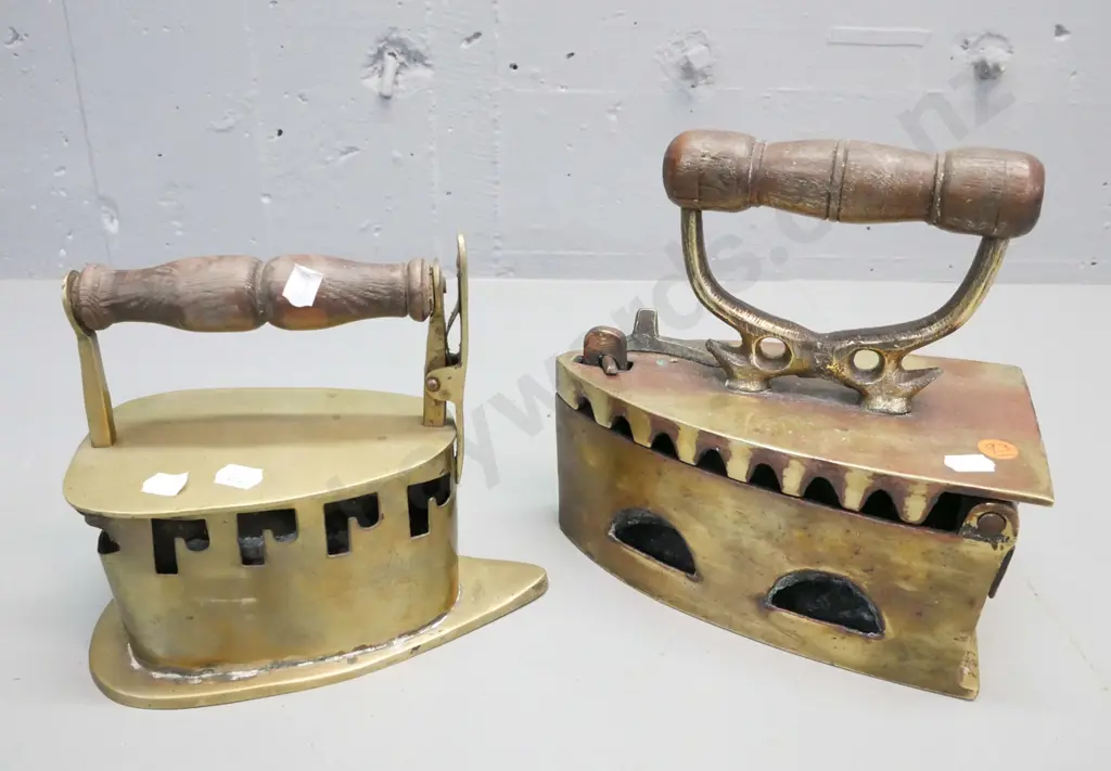 2x Chinese brass coal irons with turned wooden handles. 1. Kim Hiap Liong & Co H-220 W-210. 2. Unmarked Image 1++