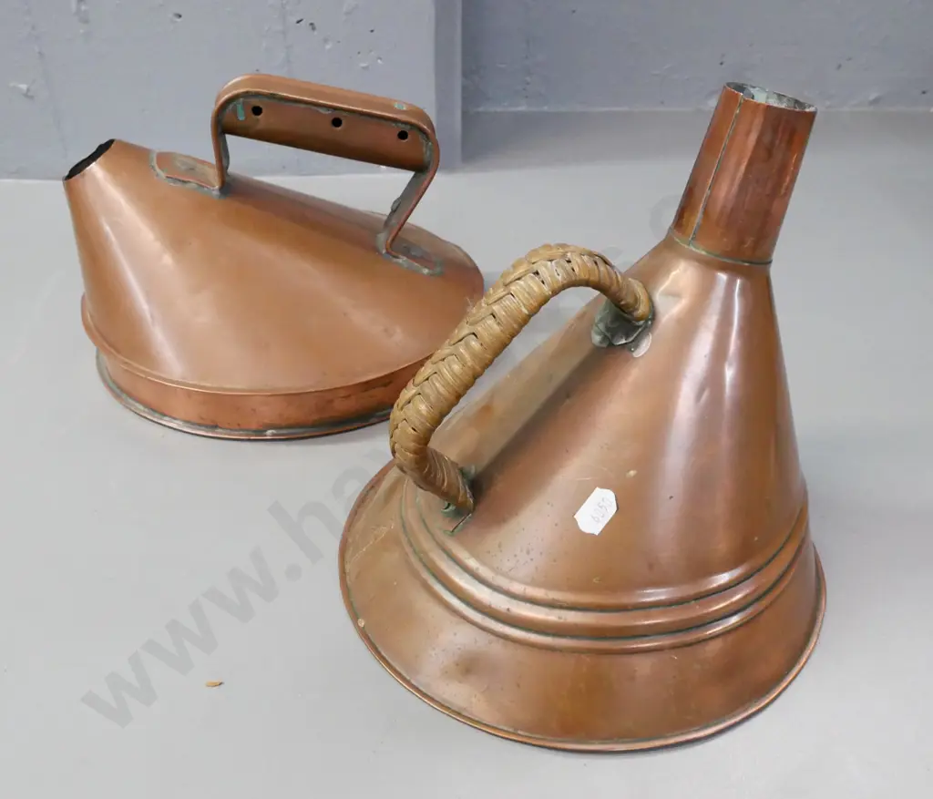 2x coppered white metal conical-shaped kettles, one with woven cane handle. Some dinting and corrosion. Image 1++