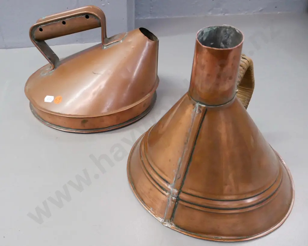 2x coppered white metal conical-shaped kettles, one with woven cane handle. Some dinting and corrosion. Image 1++