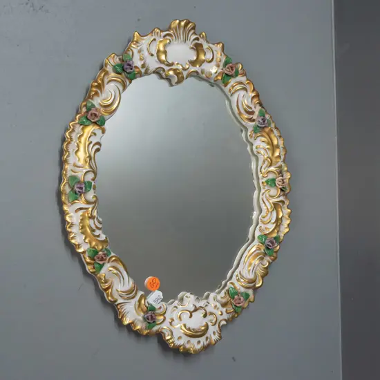 oval mirror in china floral frame marked Dresden Germany - fretting to some petals H-340 W-270