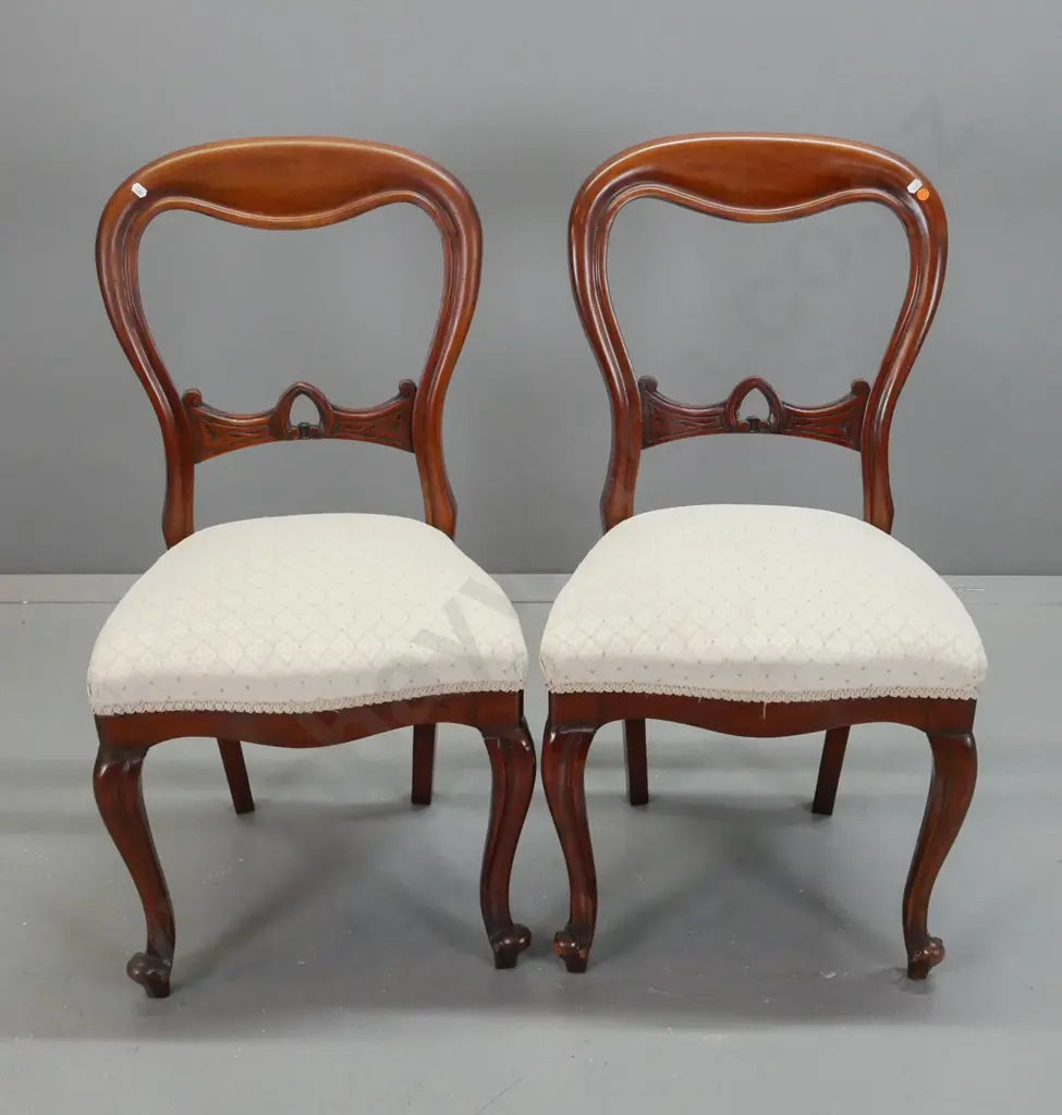 pair of mahogany balloon-back chairs with carved back splat, shaped front w/ scrolling cabriolet legs, ivory diamond Image 1++