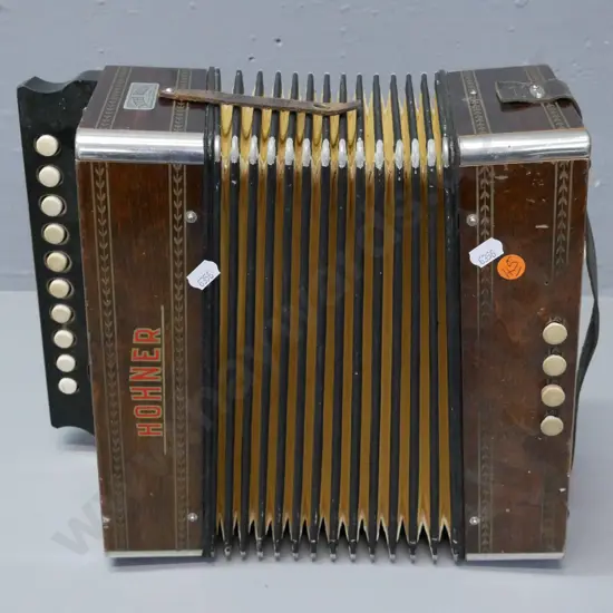 vintage Hohner Button Accordion, some evidence of borer, corrosion to corner caps & grille, wear to corners of bellows.