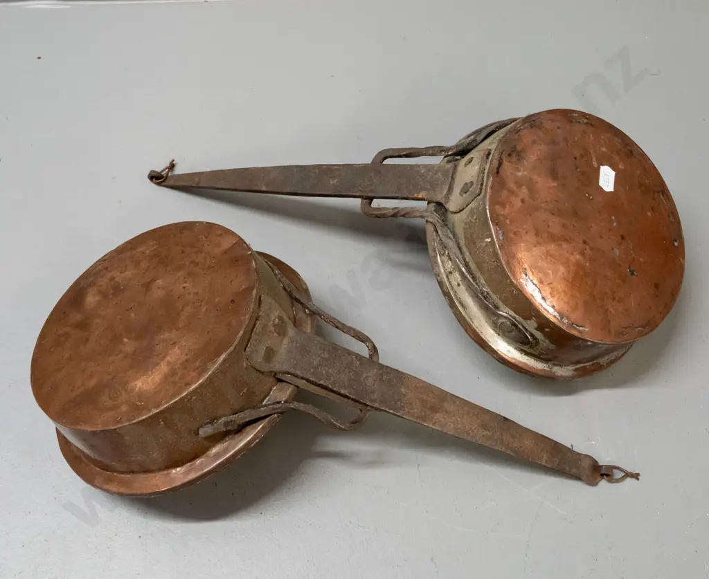 pair of vintage copper-plated saucepans with forged iron handles w/ twisted supports - age wear and denting, both approx Image 1++